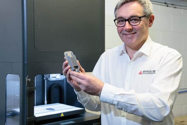 Andy Simpson with a test piece made using the Markforged Metal-X 3D printer. Picture: ASM Media & PR.