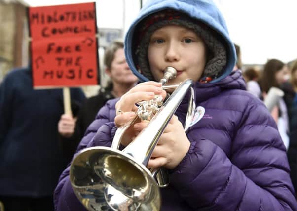 And the music will play on: protesters outside Midlothian Council (Picture: Lisa Ferguson)