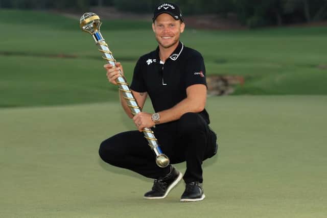 Danny Willett with the World Tour trophy, which he won last year. Picture: Andrew Redington