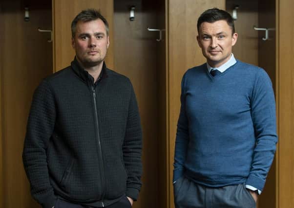 Robbie Stockdale, left, and new Hibs manager Paul Heckinbottom check in at Easter Road with a mission to produce a team that will give their all, work hard and be attack-minded. SNS