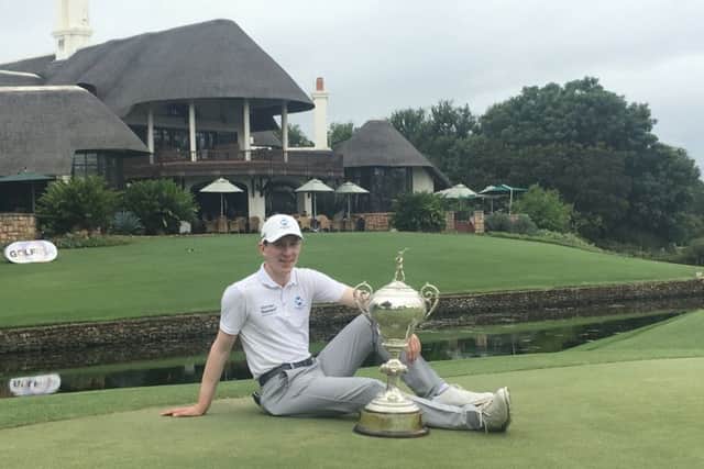 Baraassie's Euan Walker poses with the trophy after his African Amateur victory at Leopard Creek. Picture: Scottish Golf