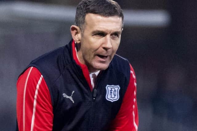 Dundee manager Jim McIntyre has backed calls to ban plastic pitches. Pic: SNS