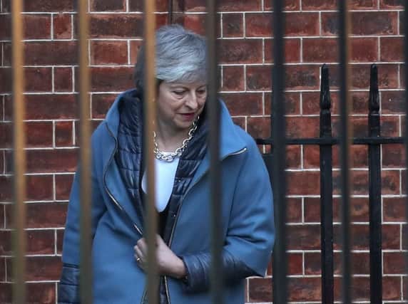 Theresa May leaves 10 Downing Street  for the House of Commons ahead of a Brexit vote today. Picture: PA