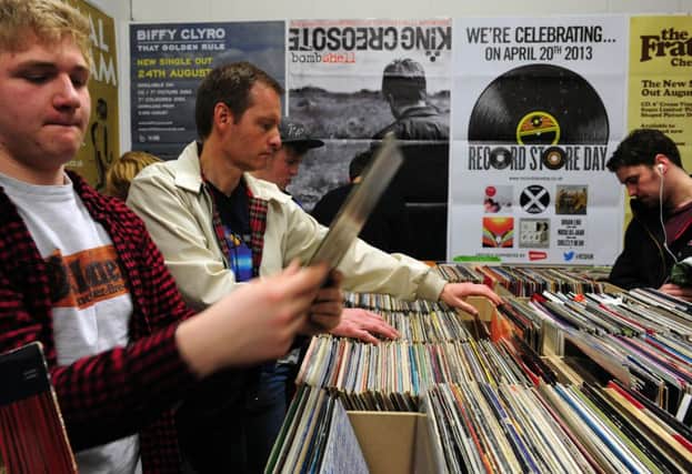 Some small businesses like record store have seen their sales take off thanks to the internet. Picture: Ian Rutherford