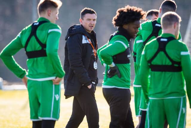 New 
Hibs head coach Paul Heckingbottom observes the players at training. Picture: Ross Parker/SNS