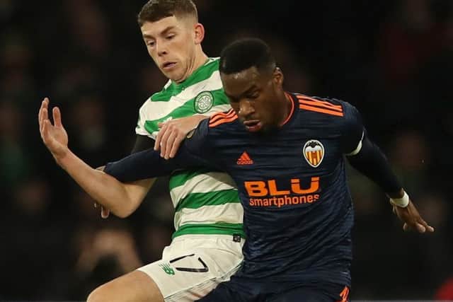 Ryan Christie battles for possession with Valencia's Geoffrey Kondogbia. Pic: Ian MacNicol/Getty