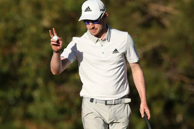 Connor Syme acknowledges the gallery after gaining a place in the final 24. Pic: Paul Kane/Getty