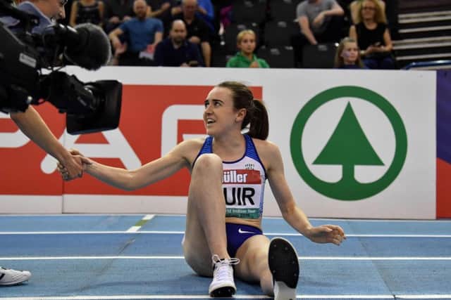Britain's Laura Muir reacts after winning the women's one mile final at the indoor athletics Grand Prix at Arena Birmingham. Pic: Ben Stansall/AFP/Getty Images