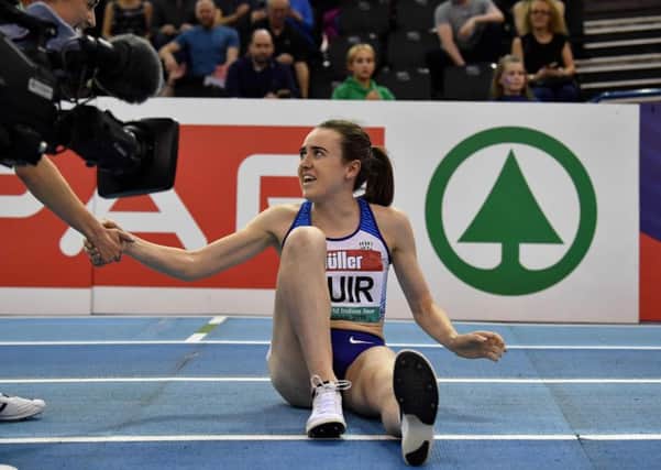Britain's Laura Muir reacts after winning the women's one mile final at the indoor athletics Grand Prix at Arena Birmingham. Pic: Ben Stansall/AFP/Getty Images