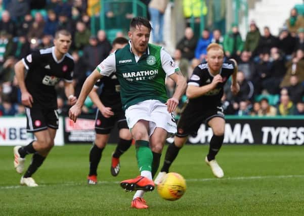 Hibernian's Marc McNulty scores his team's second from the penalty spot. Pic: SNS/Paul Devlin