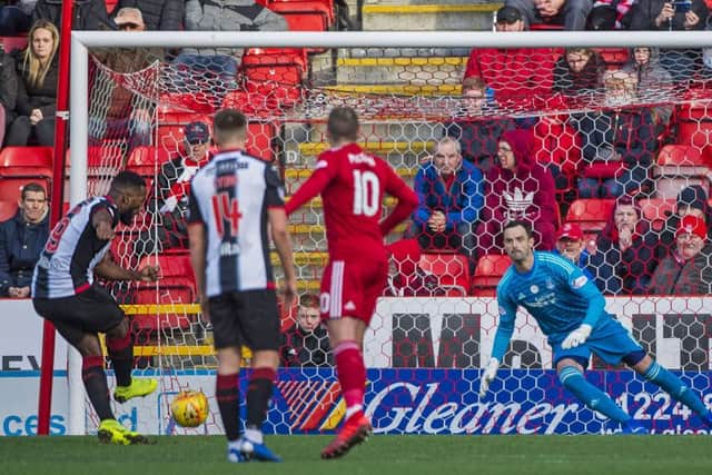 St Mirren's Duckens Nazon scores an early penalty to put the visitors ahead. Pic: SNS/Bill Murray