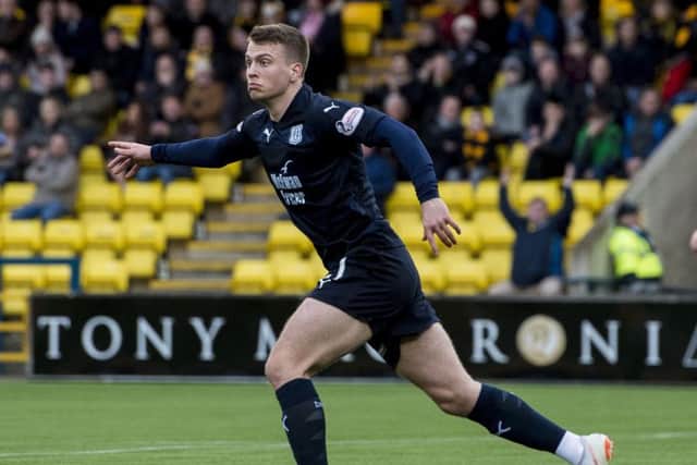 Dundee's Andrew Nelson celebrates after scoring the equaliser. Pic: SNS/Craig Foy