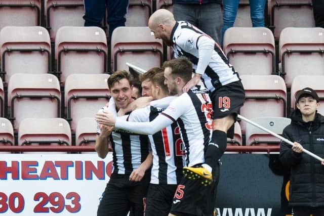 Dunfermline's Joe Thompson celebrates his goal. Pic: SNS/Ross Parker