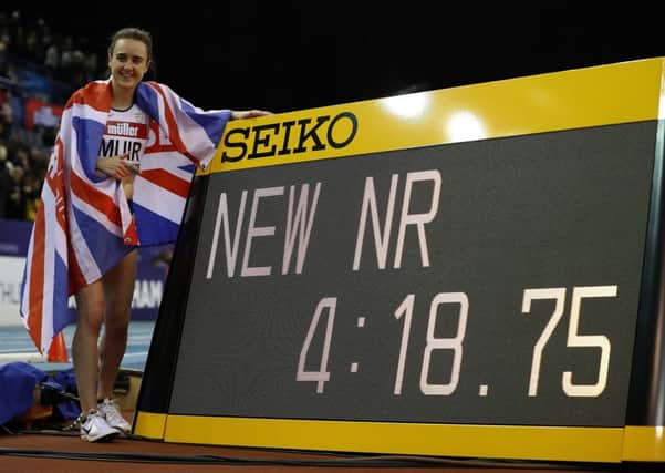 Laura Muir celebrates her new British indoor record after winning the women's mile in Birmingham. Picture: Michael Steele/Getty Images