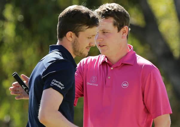 Connor Syme is congratulated by fellow Scot Bob MacIntyre during the ISPS Handa World Super 6 Perth at Lake Karrinyup. Picture: Will Russell/Getty