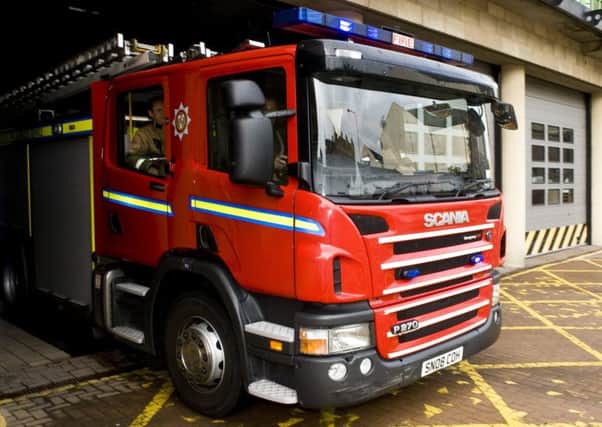 Firefighters have been tackling a blaze at Rhynagarrie Farm near Aberlour in which one man suffered minor burns.