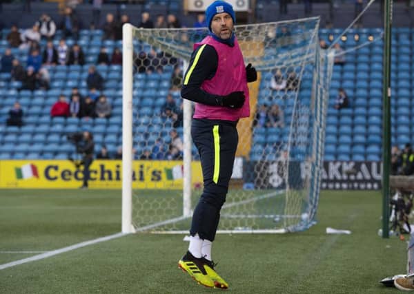 Kris Boyd warms up for Kilmarnock in front of Celtic fans. Picture: SNS/Alan Harvey