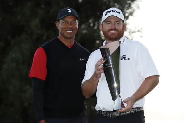 J.B. Holmes shows off the Genesis Open trophy after his triumph in an event hosted by Tiger Woods. Picture: AP