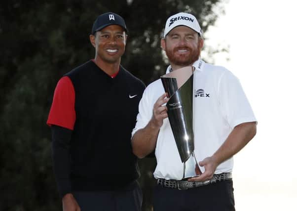 J.B. Holmes shows off the Genesis Open trophy after his triumph in an event hosted by Tiger Woods. Picture: AP