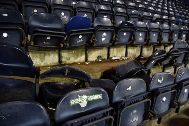 A Green Brigade sticker is seen on a seat in Rugby Park's away end after the match between Kilmarnock and Celtic. Picture: SNS Group