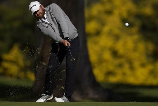 J.B. Holmes hits his second shot on the 13th hole during the final round of the Genesis Open. Picture: Ryan Kang/AP