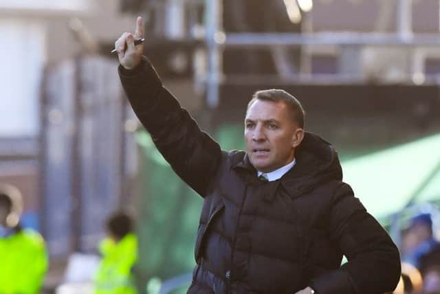 John Hartson doesn't believe Brendan Rodgers is seeking an exit from Celtic. Picture: SNS Group
