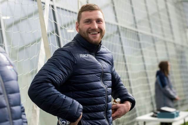 A smiling Finn Russell at Scotland's Oriam training base. Picture: Bill Murray/SNS