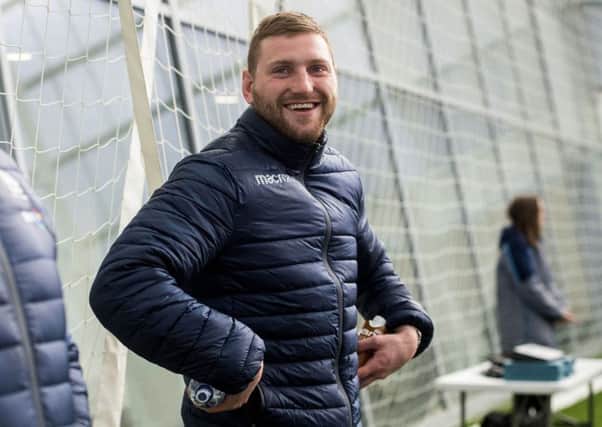 A smiling Finn Russell at Scotland's Oriam training base. Picture: Bill Murray/SNS