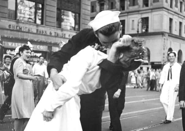 A sailor and nurse embrace in New York's Times Square. (AP Photo/United States Navy, Victor Jorgensen)