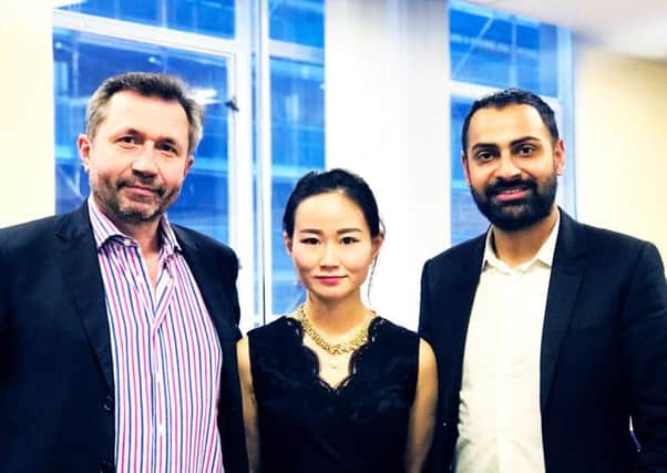 From left: Ledger Listings' Daniel Broby, Icy Zhang and Amandeep Sahota. Picture: Contributed