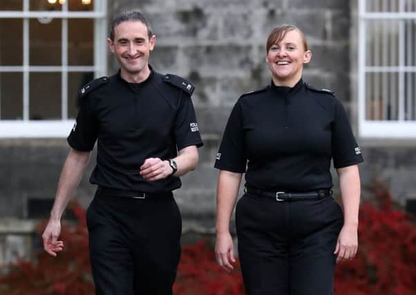 Police Constables Laura Sayer and Kenneth MacKenzie, who were seriously injured during an incident in Greenock, received an award for bravery. Picture: Andrew Milligan/PA Wire