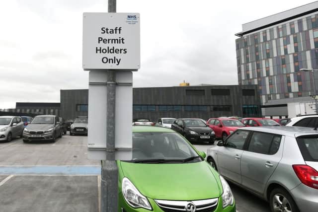 Staff could be charged for parking at work if councils bring in a new levy given the go ahead by the Scottish Government