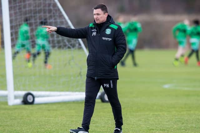 Hibs manager Paul Heckingbottom makes a point as he oversees training. Picture: Ross Parker/SNS