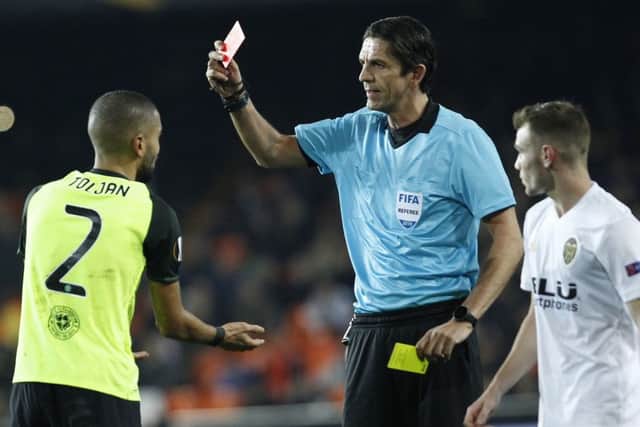 Celtic's Jeremy Toljan is sent off against Valencia. Picture: Alberto Saiz/AP