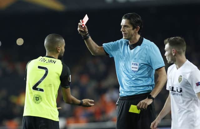Jeremy Toljan receives his second yellow card during the first half. Picture: AP