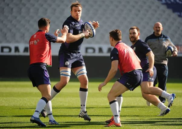 Jonny Gray in possession as the Scotland squad are put through their paces at Stade de France. Picture: David Gibson/Fotosport/REX/Shutterstock