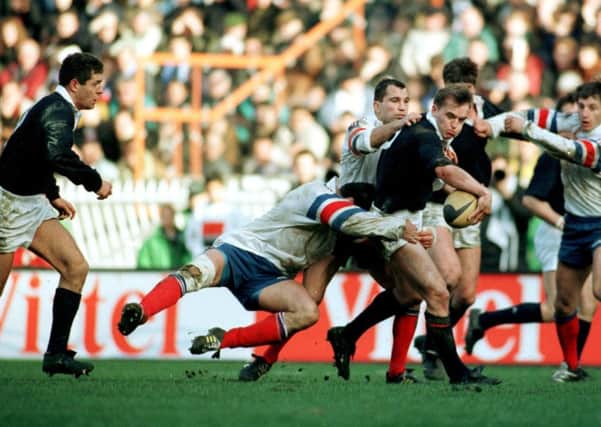 Gregor Townsend passes to Gavin Hastings to set up match winning try in Paris in 1995. Picture: Hamish Campbell