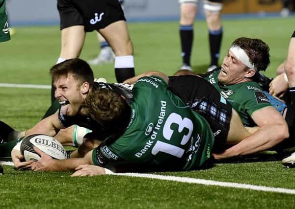 Glasgow Warriors' Robbie Nairn touches down to score a try. Picture: SNS