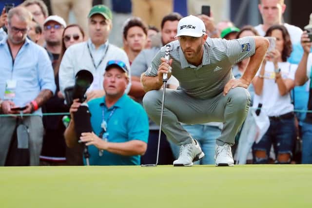 Dustin Johnson lines up a putt on his way to taking the halfway lead in the WGC-Mexico Championship. Picture: Getty Images
