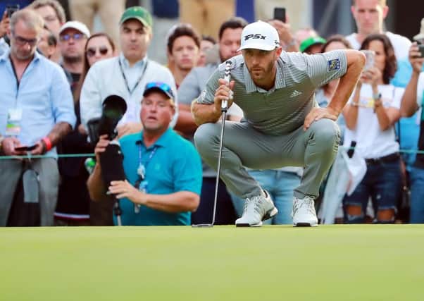 Dustin Johnson lines up a putt on his way to taking the halfway lead in the WGC-Mexico Championship. Picture: Getty Images