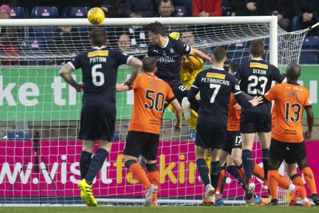Falkirk's Cieran McKenna heads home the equaliser. Pic: SNS/Craig Foy