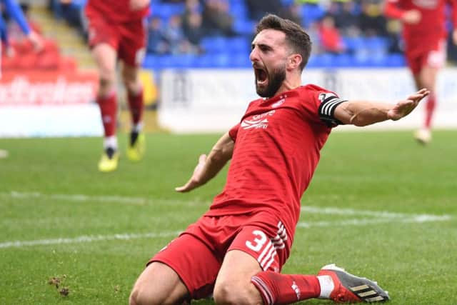 Aberdeens Graeme Shinnie celebrates the second of his two goals against St Johnstone on Saturday.