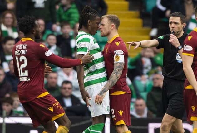 Celtic defender Dedryck Boyata and Motherwell's Richard Tait exchange words after the away side pull a goal back. Picture: SNS