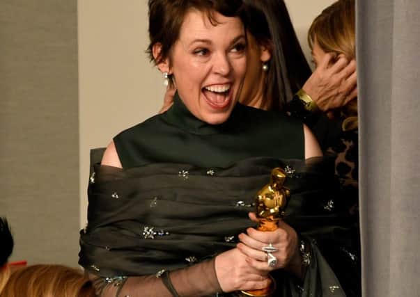 Olivia Colman celebrates winning the Best Actress Oscar for her role in The Favourite (Picture: Frazer Harrison/Getty)