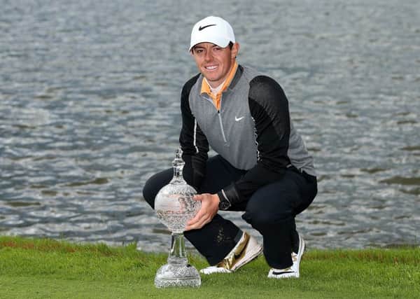 Rory McIlroy poses with the Irish Open trophy in 2016, but the 29-year-old will miss this years tournament. Picture: Getty.