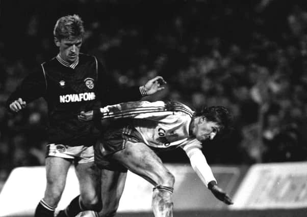 Iain Ferguson (left) tussles with Bayern Munich's Klaus Augenthaler during the Uefa Cup quarter-final first leg at Tynecastle in February 1989.