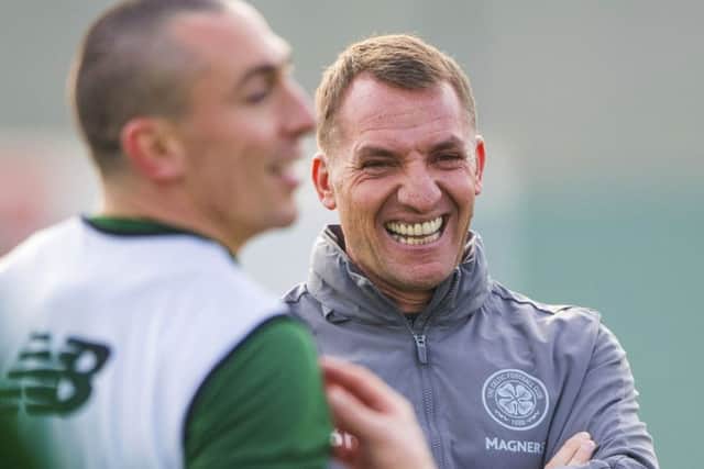 Celtic manager Brendan Rodgers with Scott Brown in training. Picture: Bill Murray/SNS