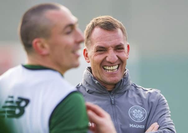 Celtic manager Brendan Rodgers with Scott Brown in training. Picture: Bill Murray/SNS