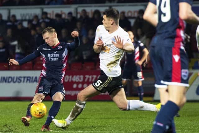 Ross County forward Billy Mckay strikes from distance to make it 2-1 to the hosts against Ayr. Picture: SNS.
