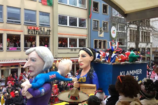 Theresa May features in a Brexit float at the Rose Monday parade.
 Picture: Dale Miller